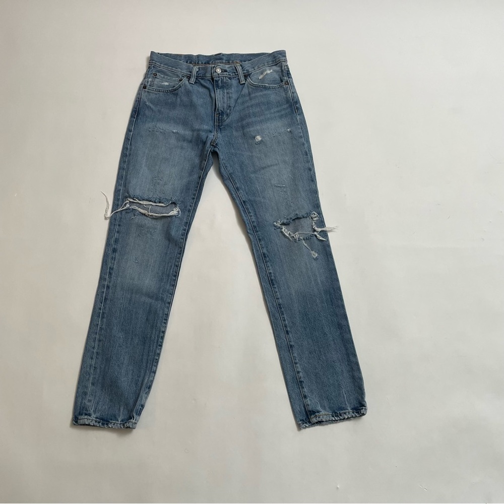 LEVI’S 511 distressed jeans